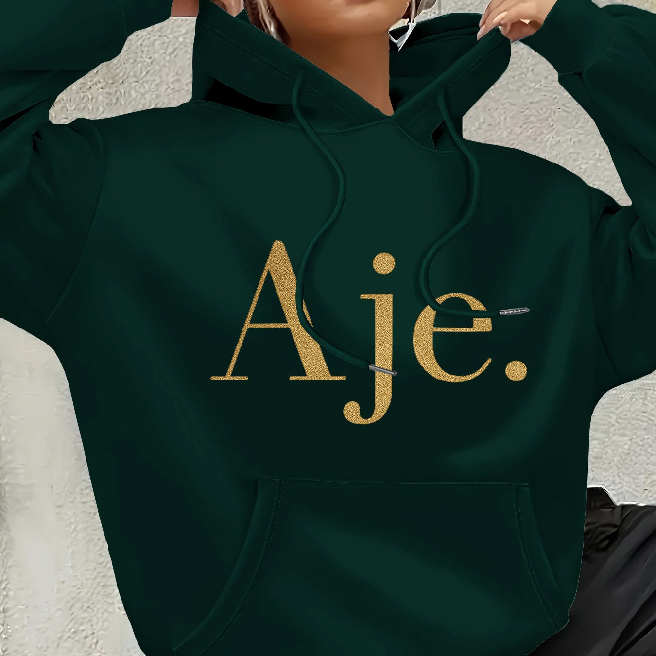 Aje Women's Fleece-Lined Hooded Sweatshirt - Golden Foil Lettering Print, Cozy Casual Pullover for Fall/Winter, Machine Washable, Cute Sweatshirts, Winter Outfit, Relaxed Fit, Comfortable Material, Printed Hoodie, Streetwear Lovers, Fall Fashion, Trendy H