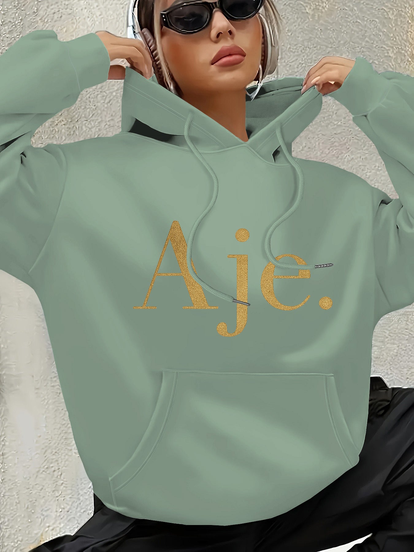 Aje Women's Fleece-Lined Hooded Sweatshirt - Golden Foil Lettering Print, Cozy Casual Pullover for Fall/Winter, Machine Washable, Cute Sweatshirts, Winter Outfit, Relaxed Fit, Comfortable Material, Printed Hoodie, Streetwear Lovers, Fall Fashion, Trendy H