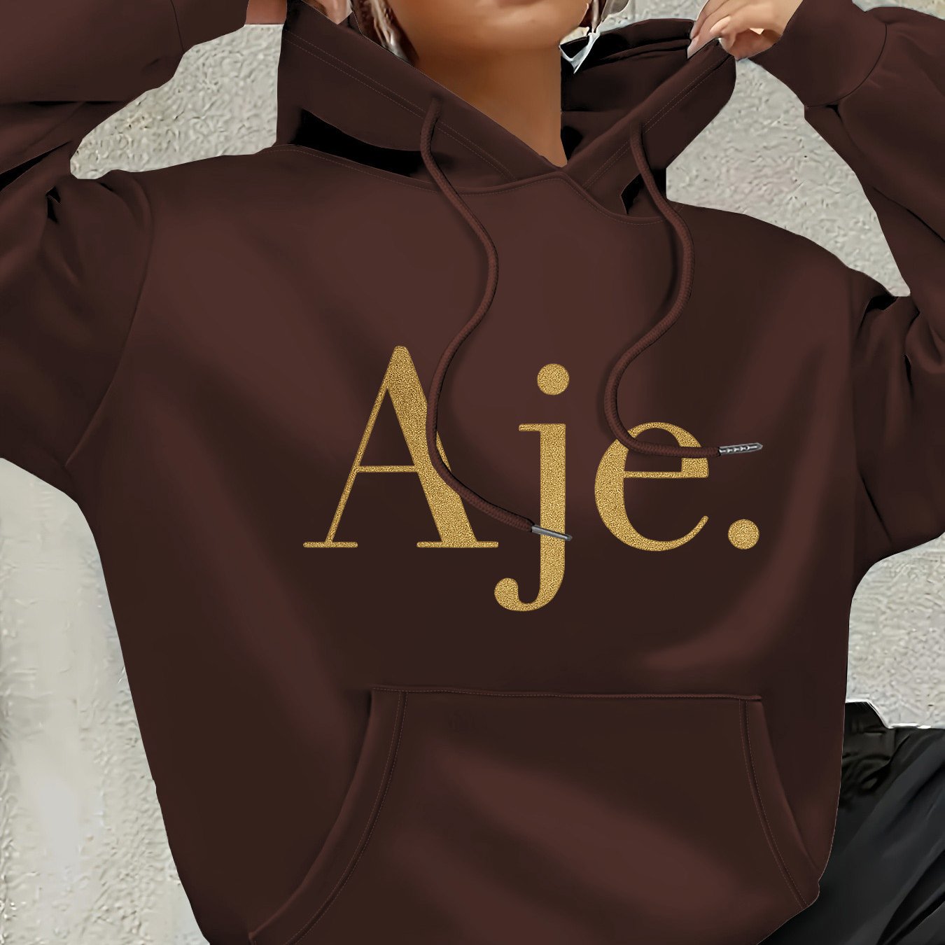 Aje Women's Fleece-Lined Hooded Sweatshirt - Golden Foil Lettering Print, Cozy Casual Pullover for Fall/Winter, Machine Washable, Cute Sweatshirts, Winter Outfit, Relaxed Fit, Comfortable Material, Printed Hoodie, Streetwear Lovers, Fall Fashion, Trendy H