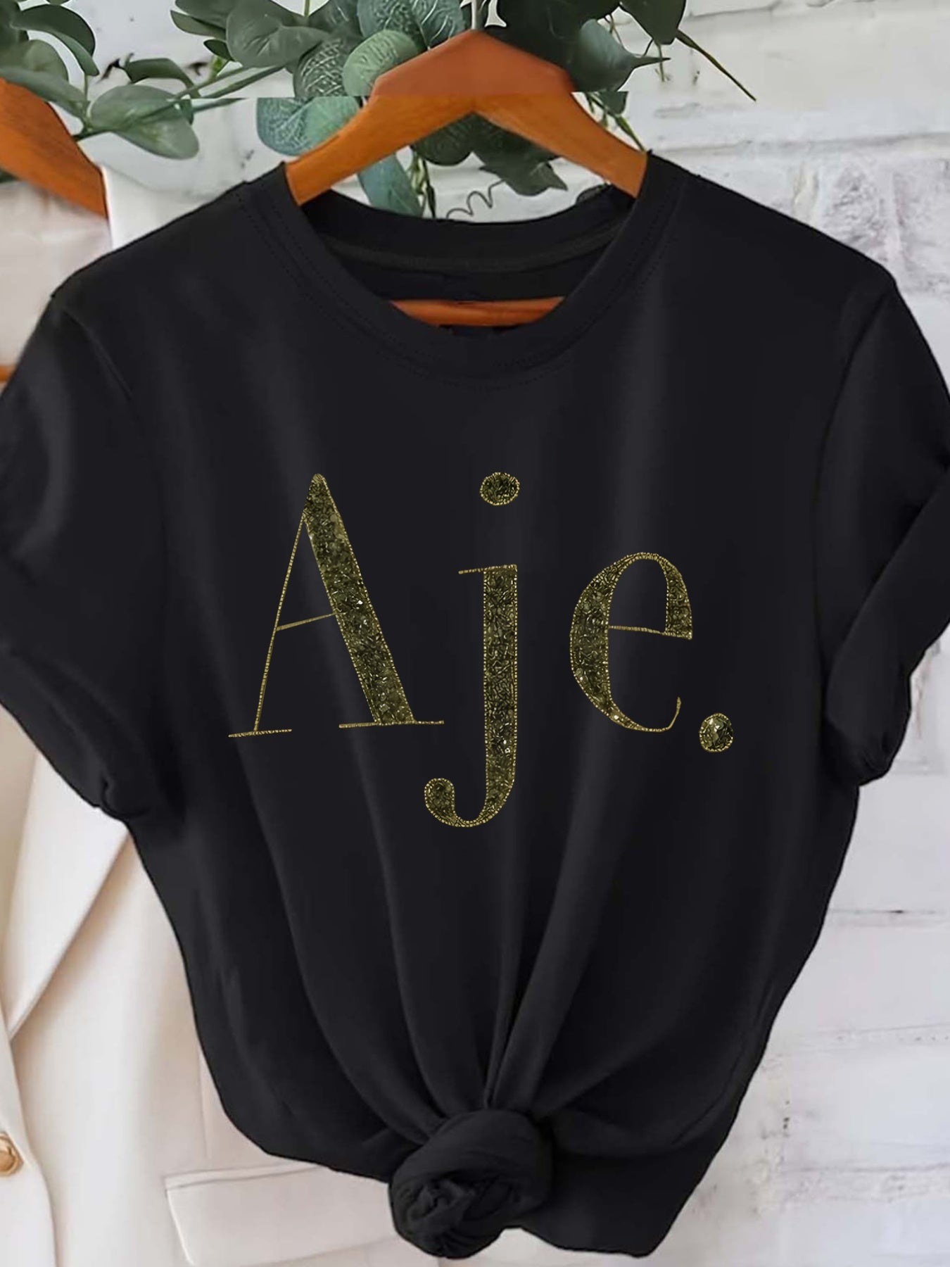 Women's Black Short Sleeve Crew Neck T-Shirt with Golden Glitter AJE Letter Print - Casual All-Season Machine Washable Top, Ladies T Shirts, Everyday Fashion, Trendy Graphic Tee, Comfortable Fit