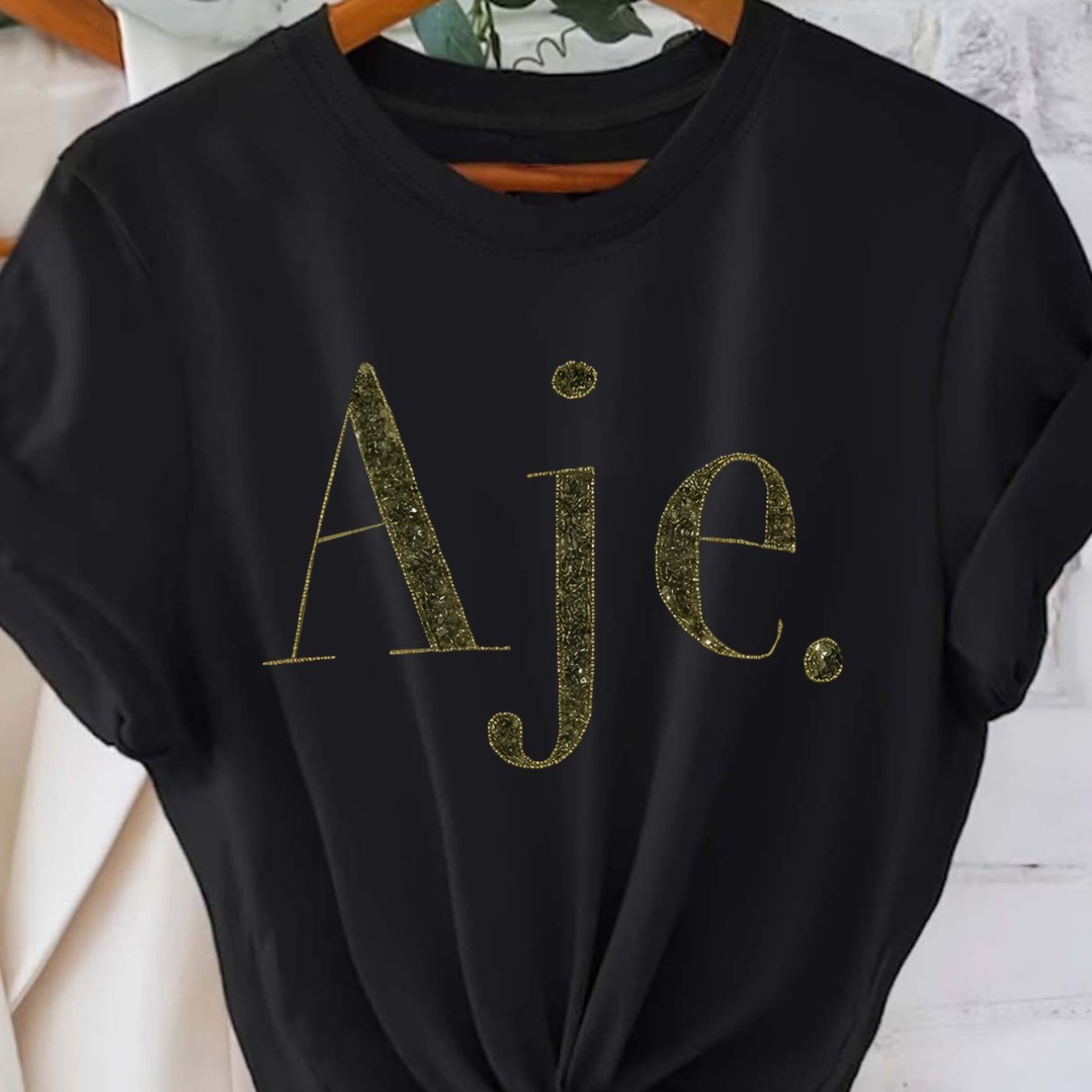 Women's Black Short Sleeve Crew Neck T-Shirt with Golden Glitter AJE Letter Print - Casual All-Season Machine Washable Top, Ladies T Shirts, Everyday Fashion, Trendy Graphic Tee, Comfortable Fit